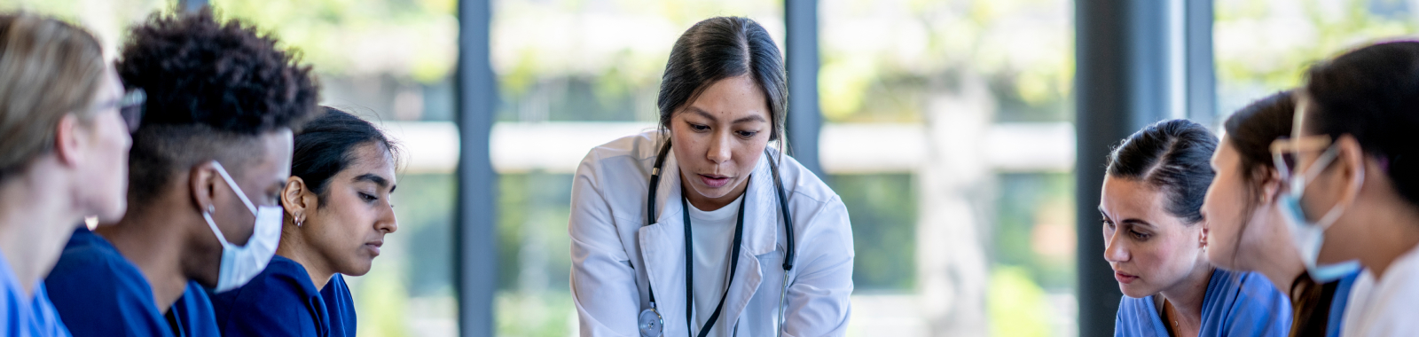 A team of medical experts discussing strategies in the fight against cancer