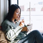 Woman eating fresh prepared food